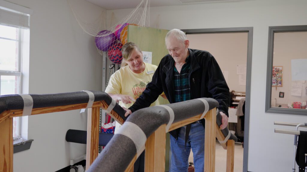 A man goes through short term care facility physical therapy
